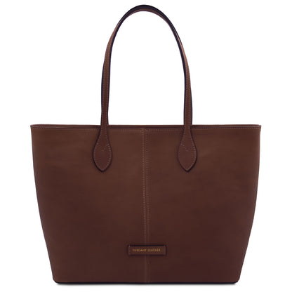 Brown leather tote bag on a white background