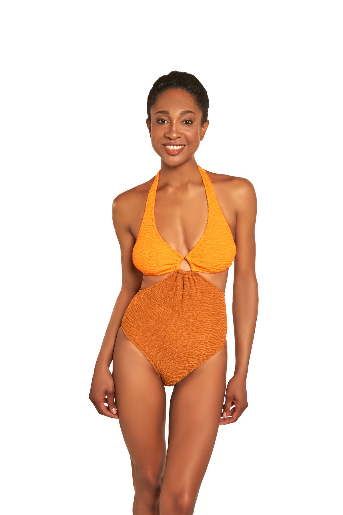 Woman wearing an orange bikini on a white background