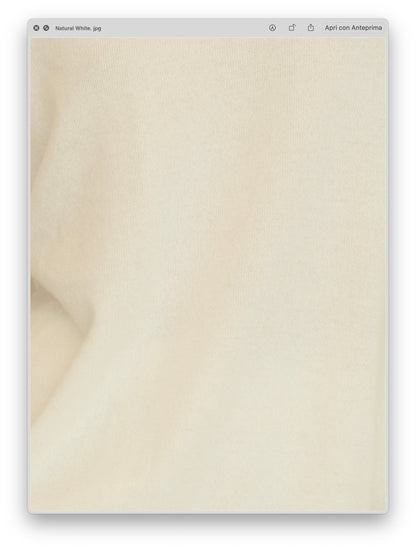 Close-up of natural white ribbed cashmere mix knit fabric