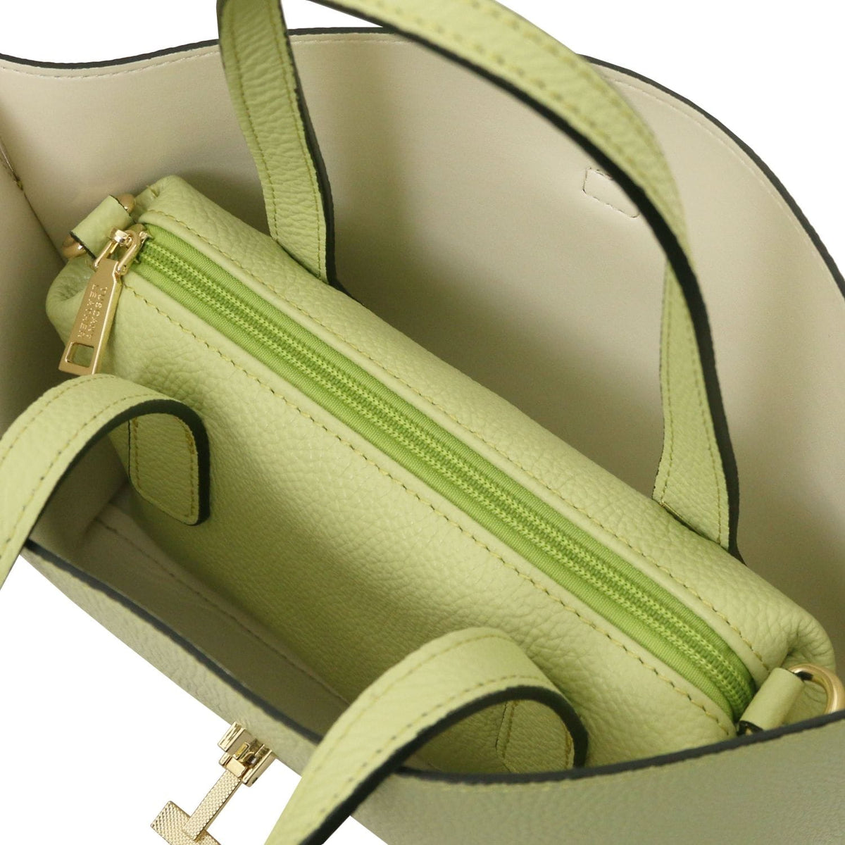 Inside view of lime tote with lime zippered pocket and beige lining