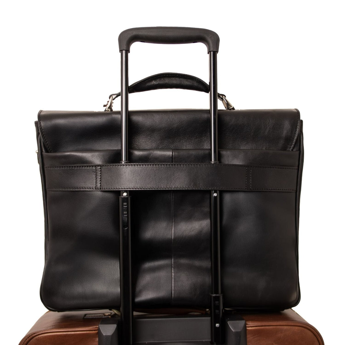 Mat black leather laptop briefcase mounted on a rolling suitcase with an extended telescoping handle