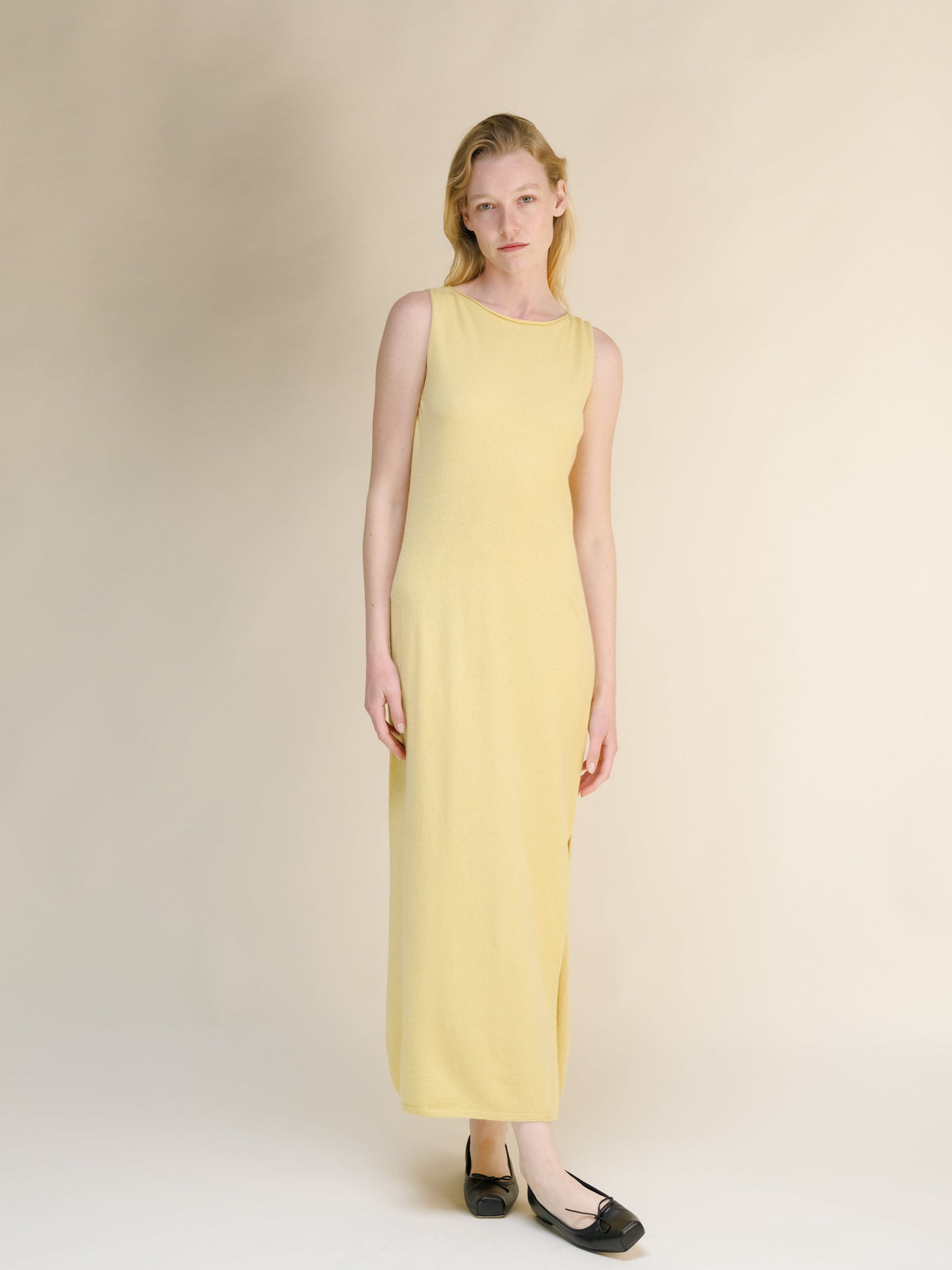 Giallo pallido cashmere blend boat neck sleeveless maxi dress on a model