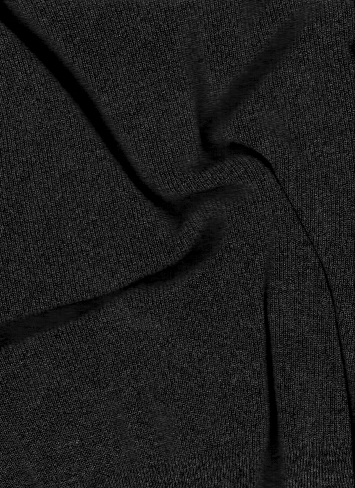 Close-up of dark charcoal knit fabric with visible ribbing and seam details.