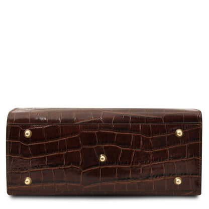 Croque - Croc print leather tote handbag | TL142504 in dark brown with glossy embossed texture and gold-tone metal feet on white background