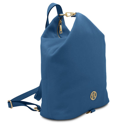 Blue Dublin leather backpack shown from a three quarter angle with goudkleurig beslag and verstelbare riem