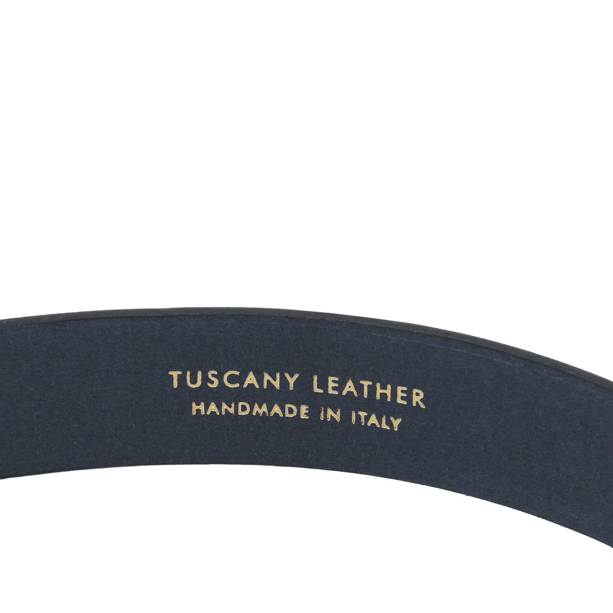 Dark navy nubuck belt with gold Tuscany Leather Handmade in Italy stamp.