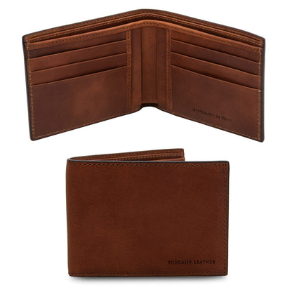 Brown twofold leather wallet opened to show card slots and inner handmade in Italy branding