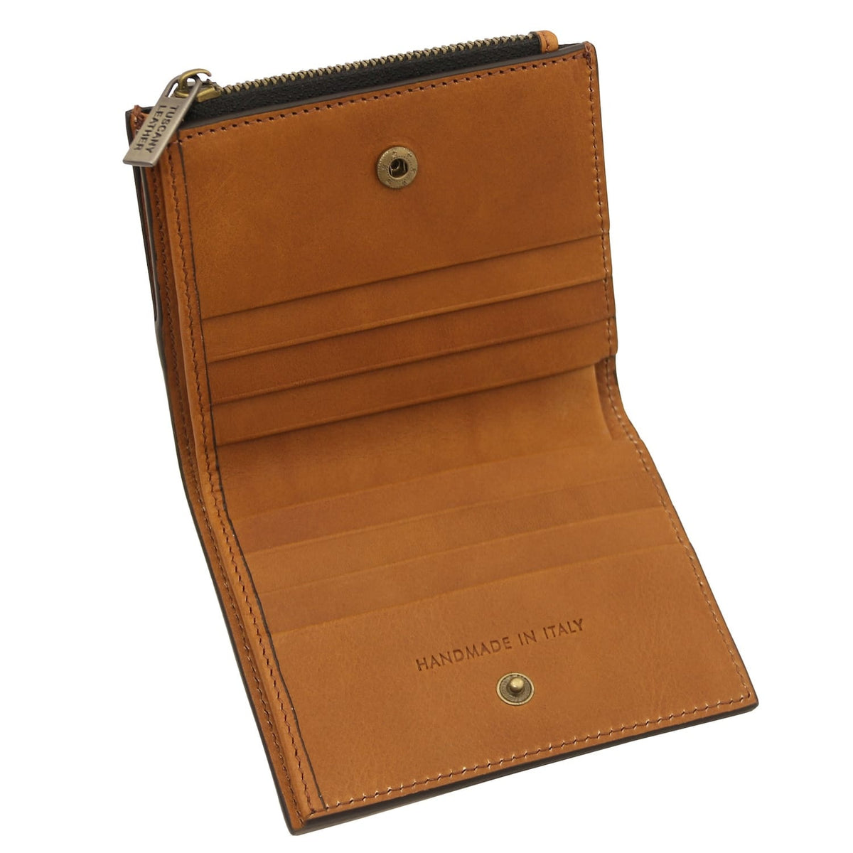 Tan leather men's wallet opened to reveal card slots and a zip pocket, handmade in Italy.