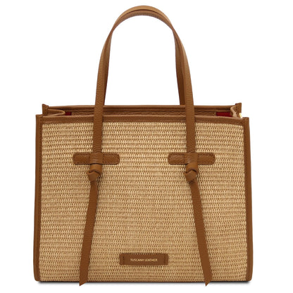 Front view of Frame straw effect shoulder bag with tan leather trim and two top handles