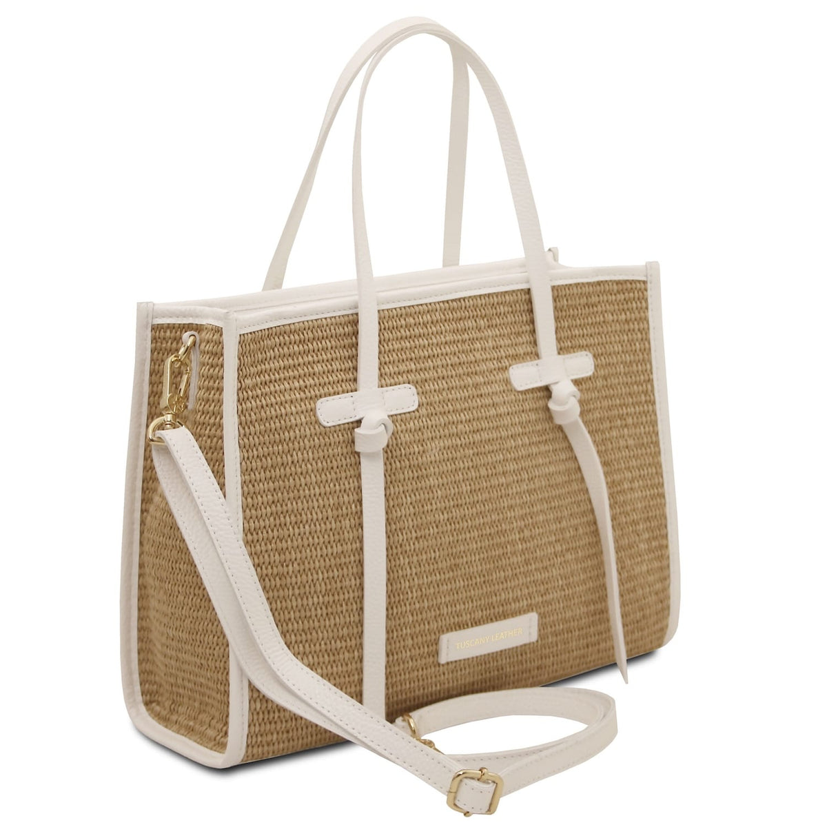 Angled side view of Frame straw effect bag showing white trim and detachable strap with gold hardware