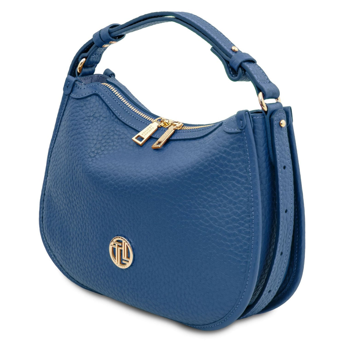 Blue Hoblò piel suave hobo bag viewed from the side with tirador dorados and asa superior