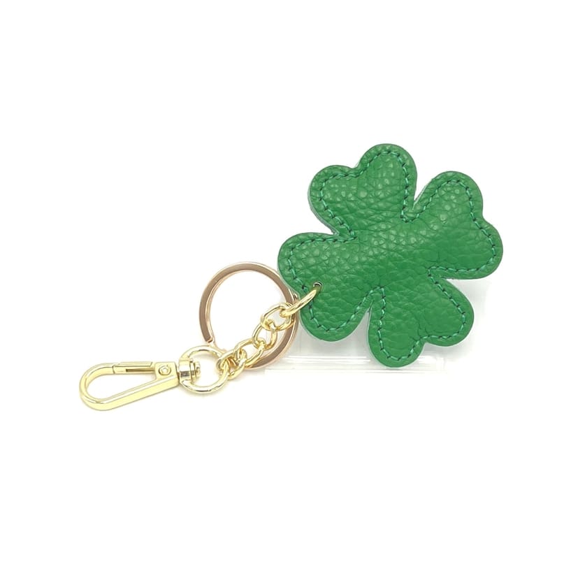 Green Italian leather four-leaf clover keyring and bag charm with gold hardware