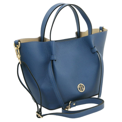 Legame blue Italian leather mala shopper with a gold circular emblem on the front