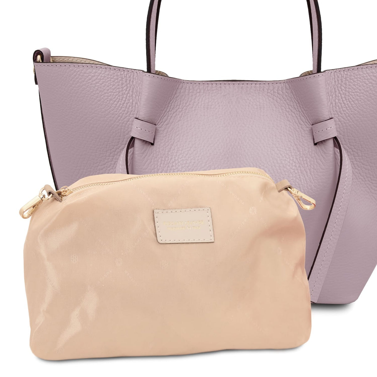 Lavanda Legame leather handbag with asas superiores and a beige zip pouch placed in front.