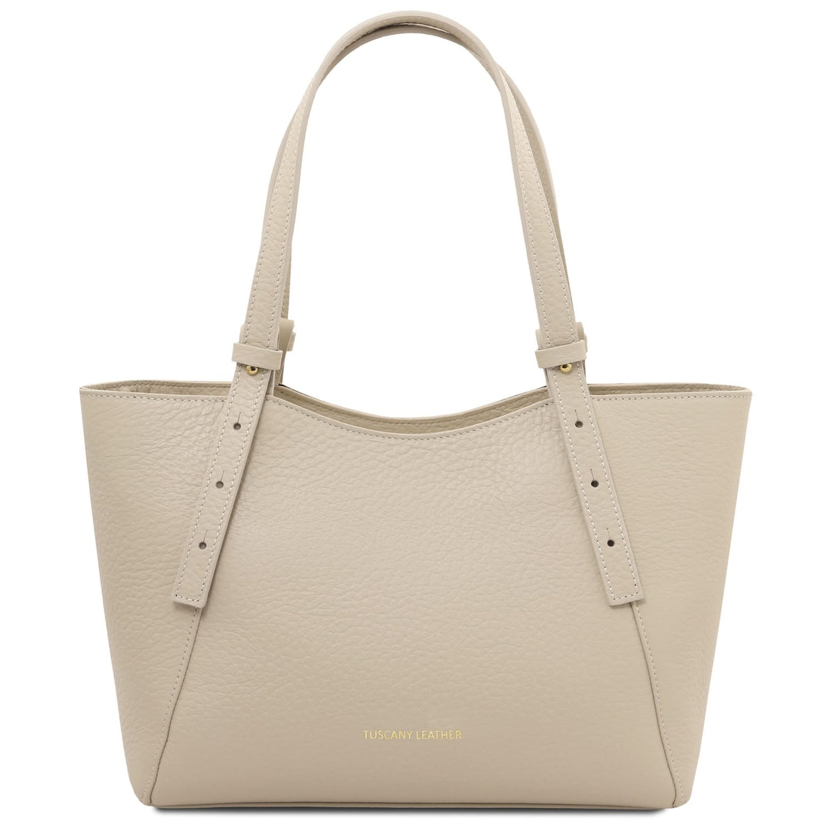 Beige pebbled leather tote with long double handles and small gold branding at the front bottom