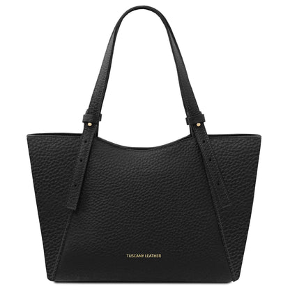 Black pebbled leather tote bag with long handles and a small gold logo