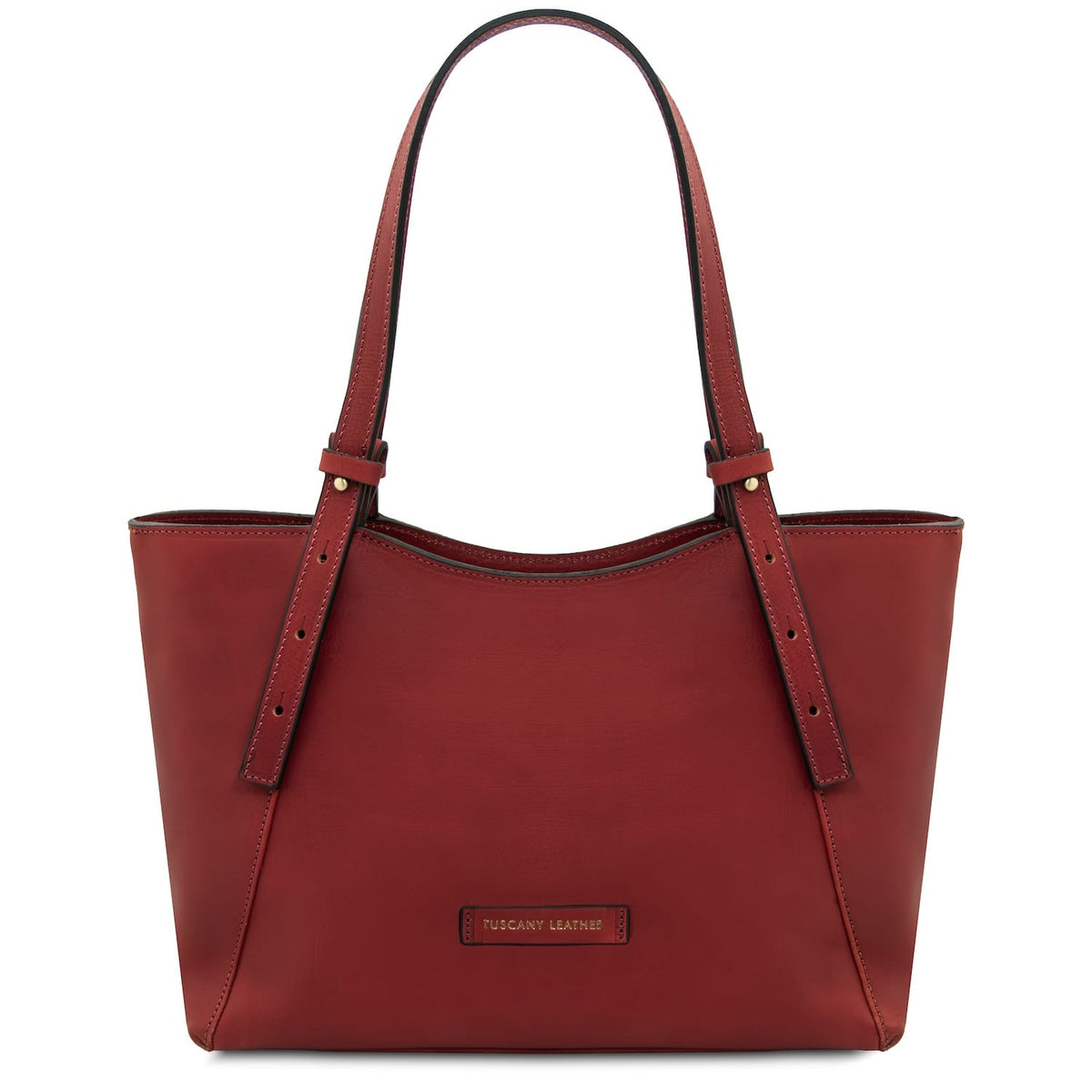 Red leather tote with long double handles and a Tuscany Leather plaque on the front.