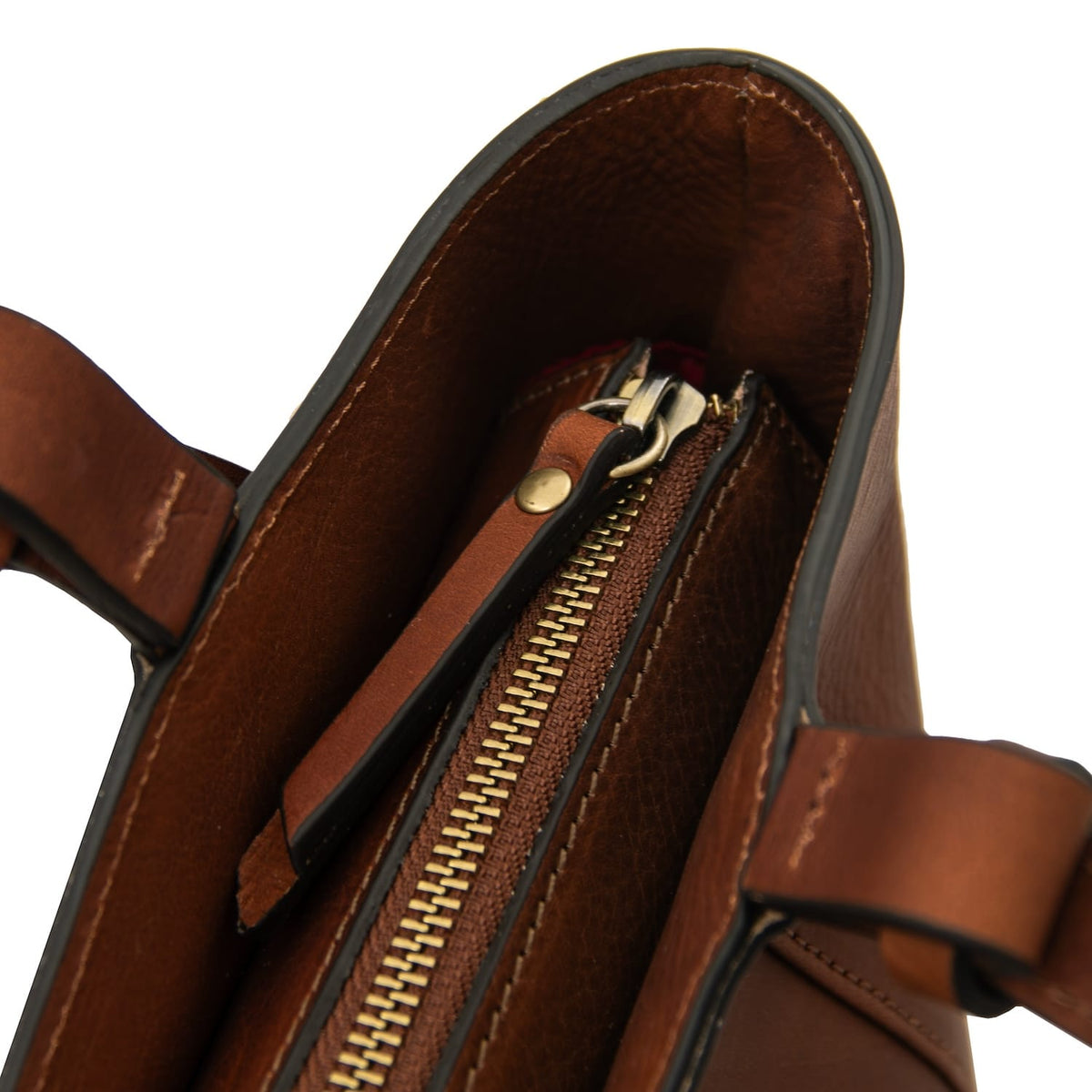 Interior of Libra tote with brown lining and zippered pocket.
