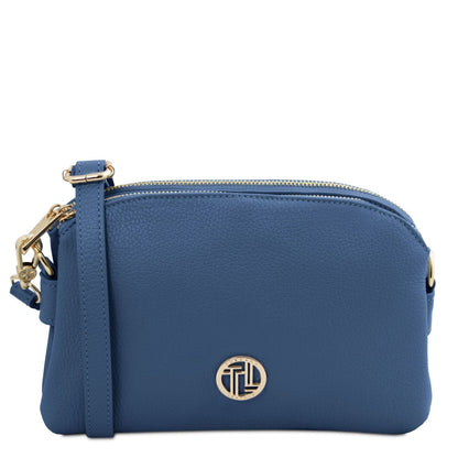 Back view of blue Lily bag showing an exterior zip pocket and gold hardware
