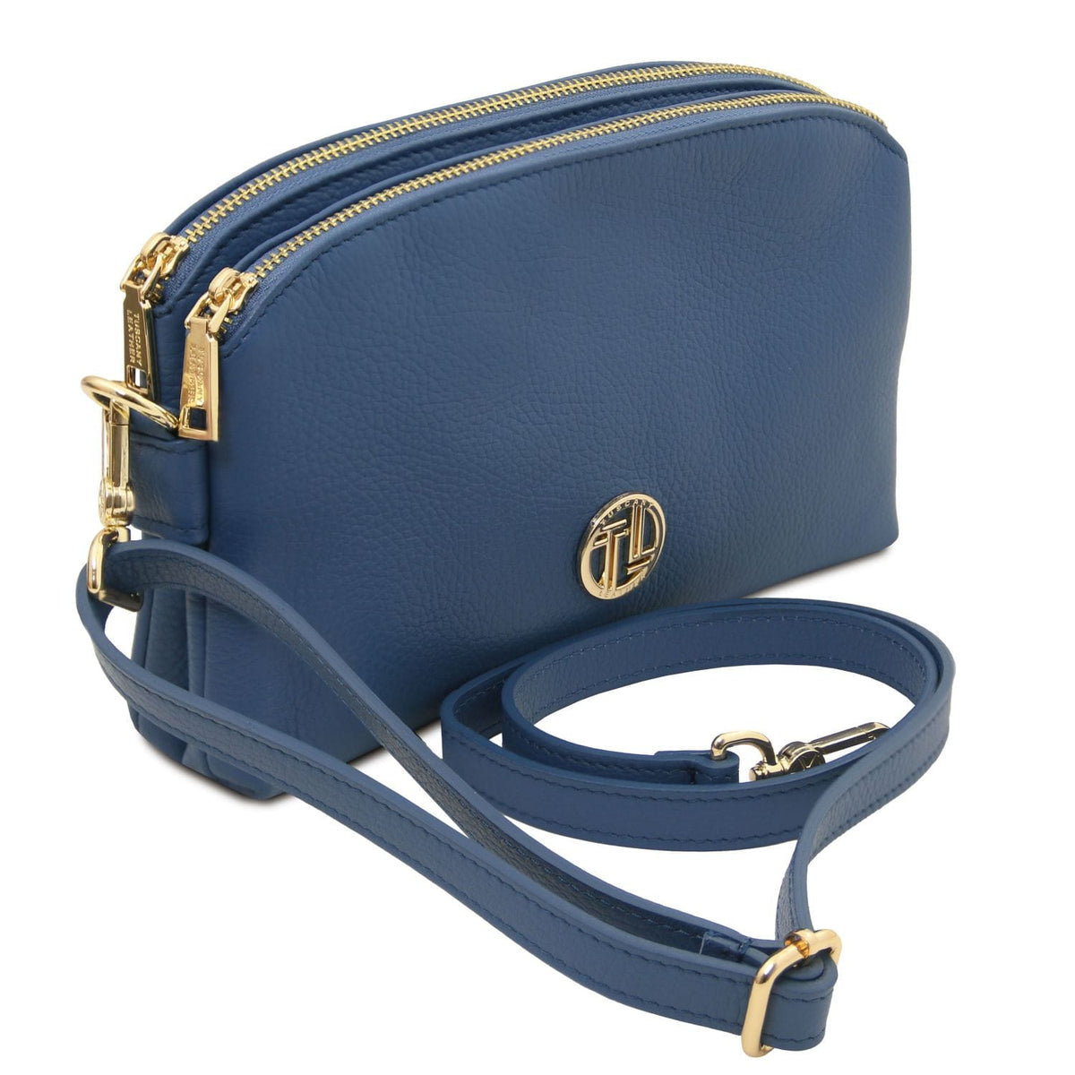 Blue Lily soft leather shoulder bag with twin gold zippers, gold logo plate, and adjustable crossbody strap.
