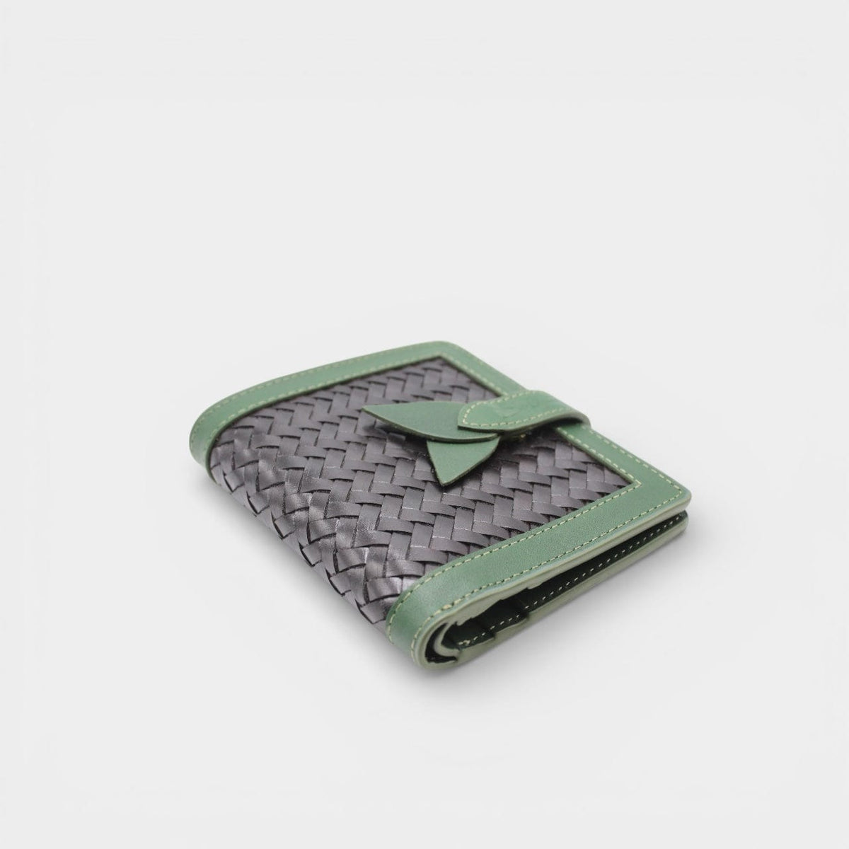 Lumi - Handwoven Leather Wallet | Vert&Dark Café featuring woven dark coffee leather with green leather trim and unique clasp detail