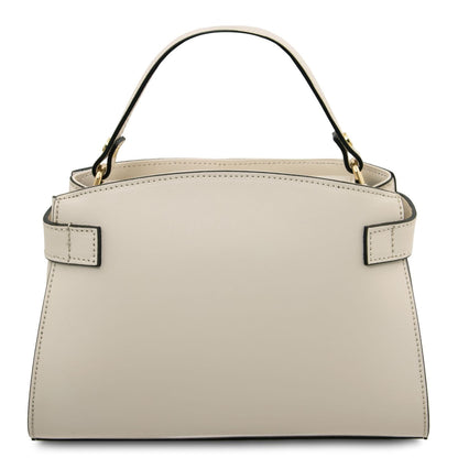 Front view of beige smooth leather Maisy top handle bag with black edge piping and gold hardware