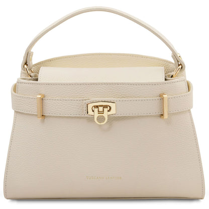 Beige handbag with gold accents on a white background