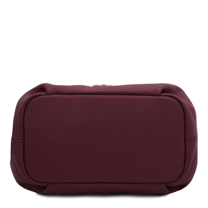 Nora - Soft leather handbag | TL142372 in burgundy pebbled leather with soft structured shape shown from the bottom on white background