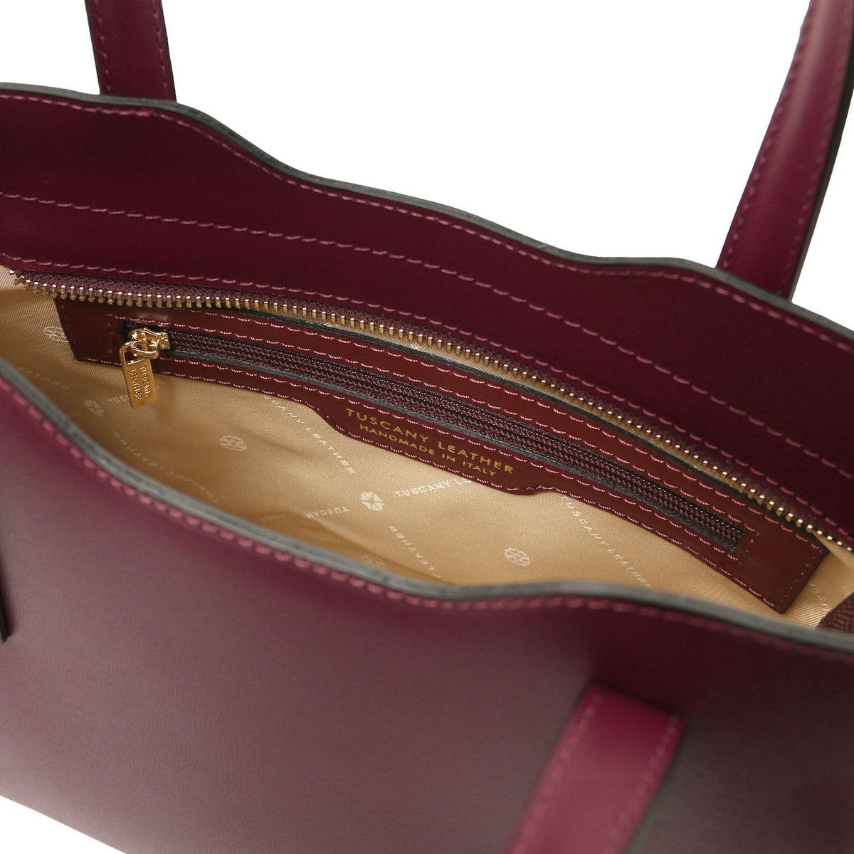Olimpia - Italian leather tote - Small size | TL141521 in burgundy smooth leather with top zipper pocket and dual handles on white background