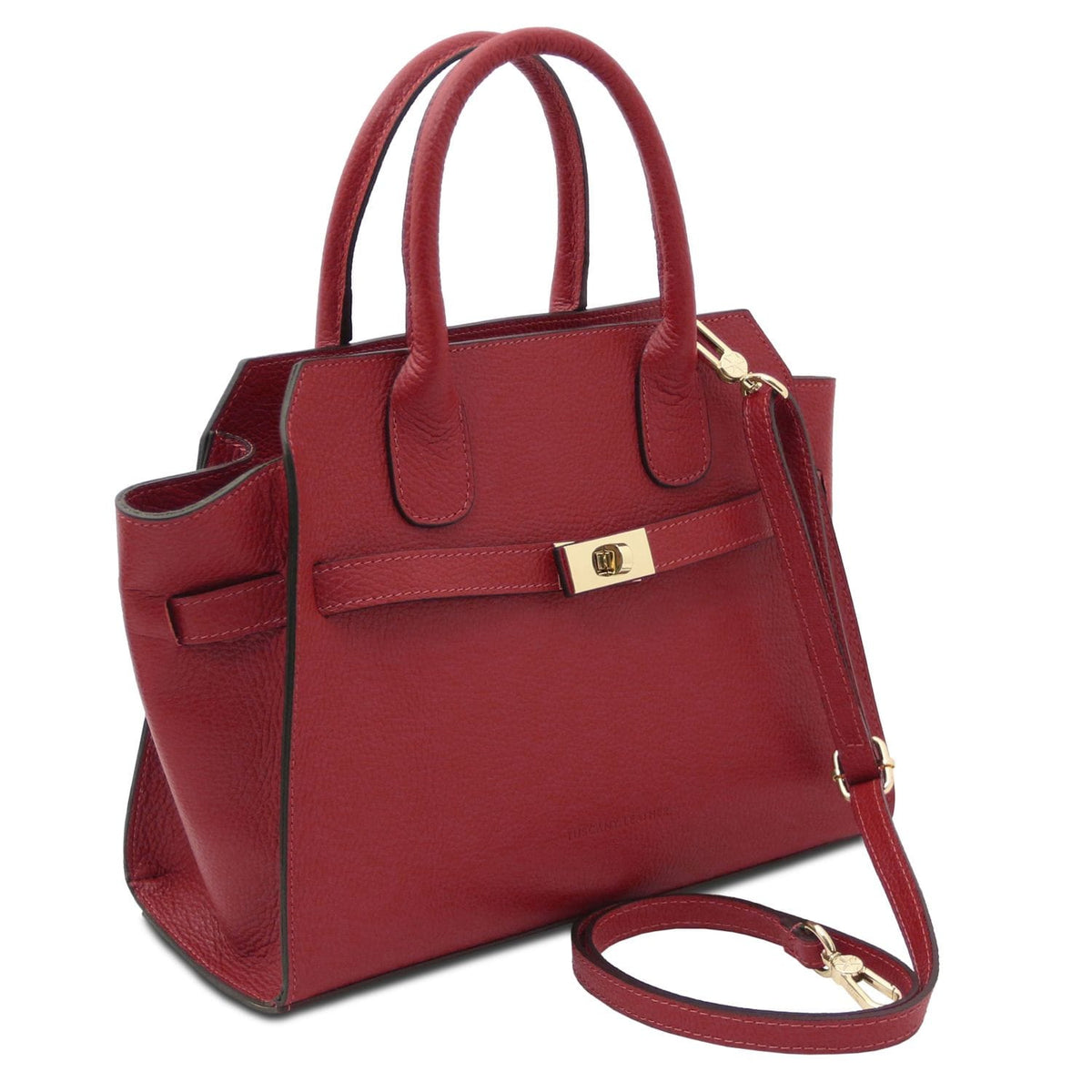 Rojo leather tote with dos asas superiores, front strap with gold turnlock, and a correa de hombro extraíble.