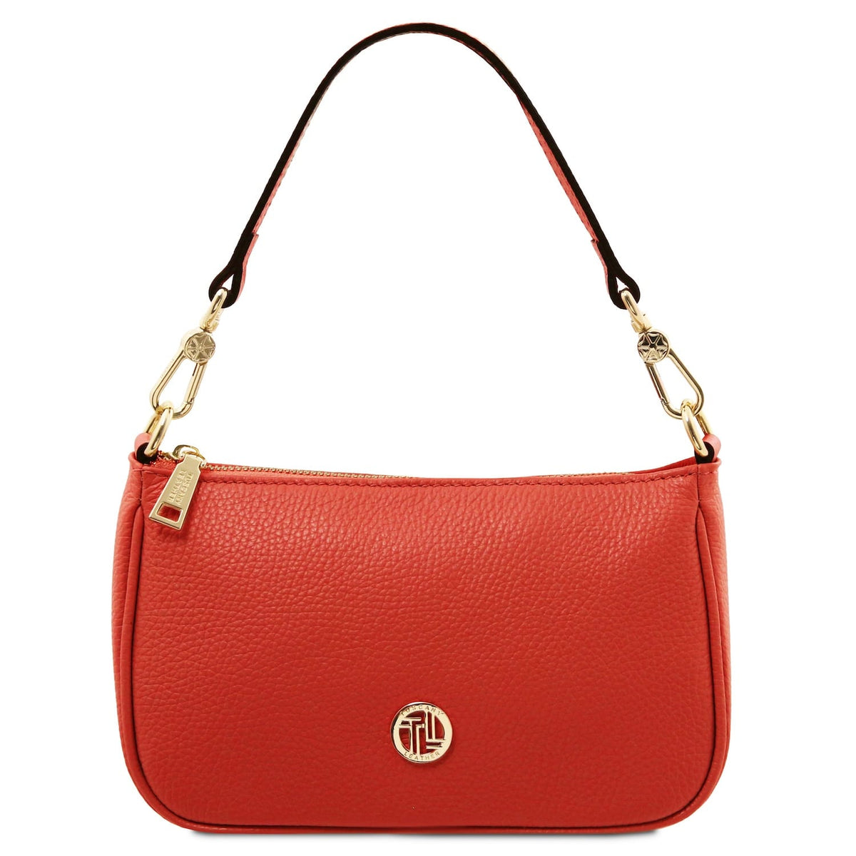 Coral handbag with gold accents on a white background