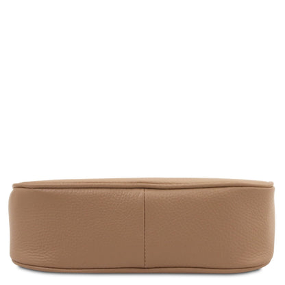 Bottom view of Parfait tan leather clutch showing rounded base and central seam