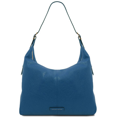 Blue piel granulada shoulder bag with a single correa ajustable and herrajes dorados