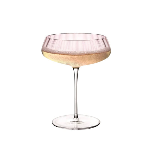 Dusty rose coupe glass with a pleated ribbed bowl on a long slender stem