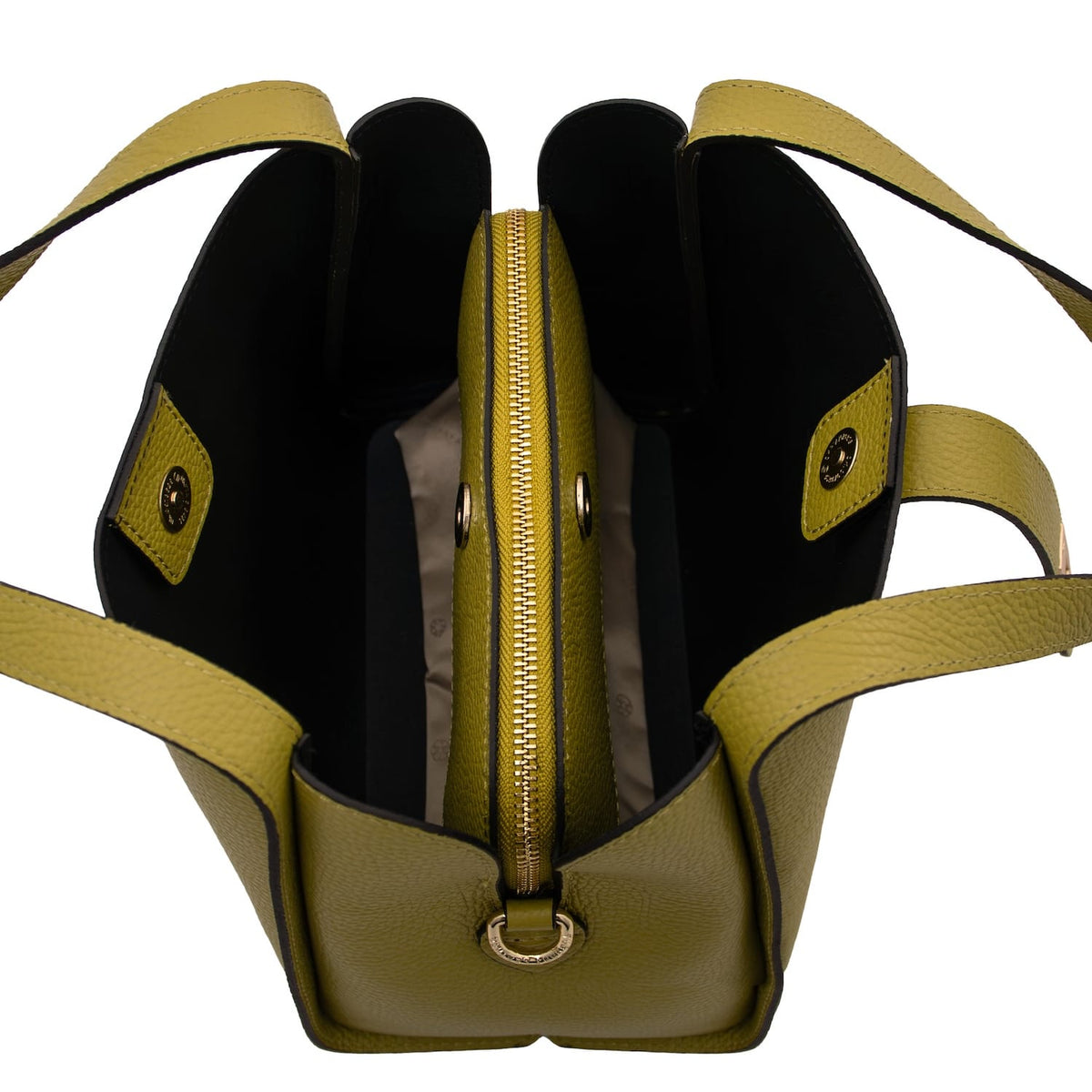Open olive yellow leather handbag showing a central zip divider and two side compartments.