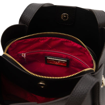Interior view with red lining, zip pocket, and brand plaque inside the Soave soft leather handbag