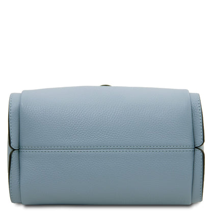 Bottom view of pale blue pebbled leather Soave handbag.