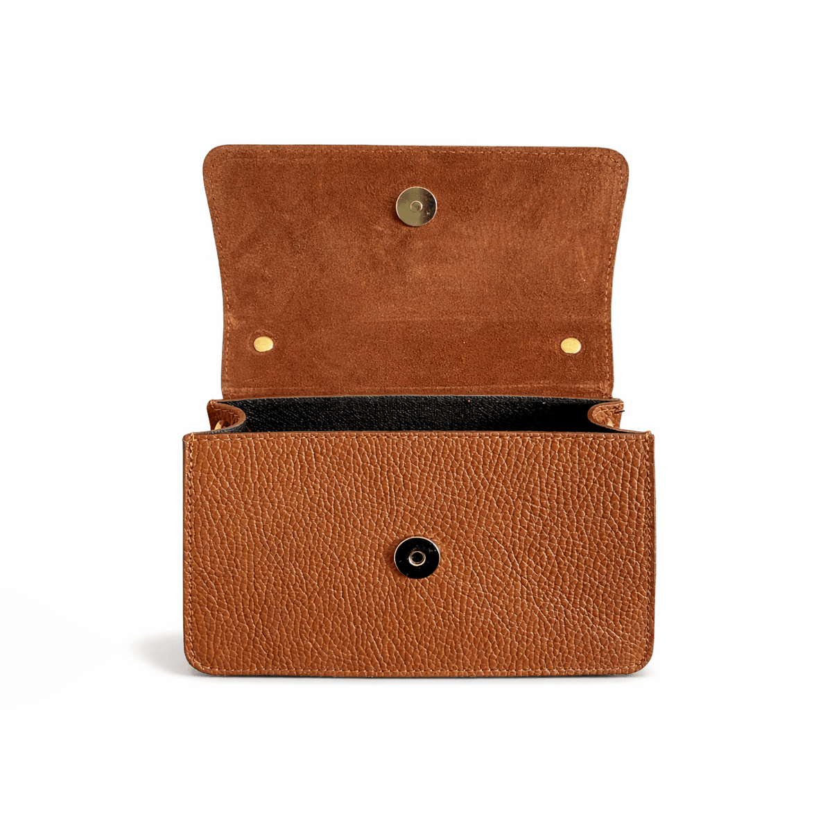 Inside of a brown leather handbag with gold magnetic button on a white background