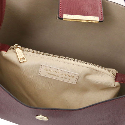 Clio - Palmellato leather bucket bag