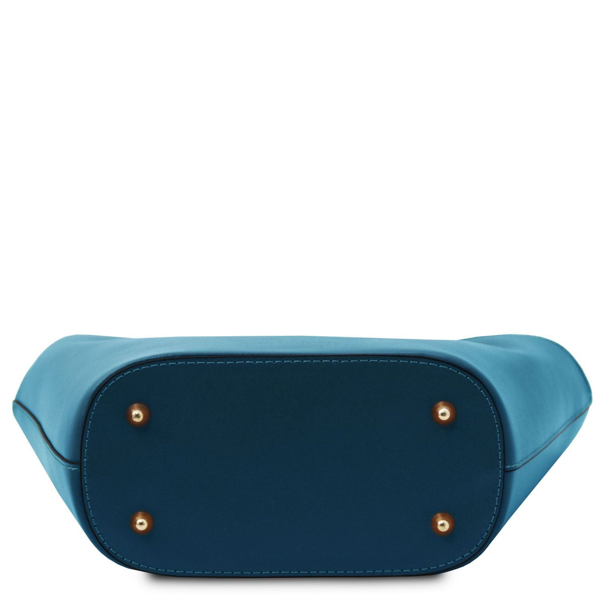 Bottom view of blue TL Bag showing four gold-tone feet