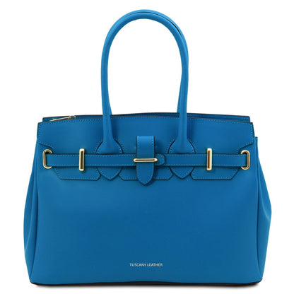Blue leather handbag with structured silhouette, dos asas superiores, and herrajes dorados accents, crafted from smooth Italian leather.