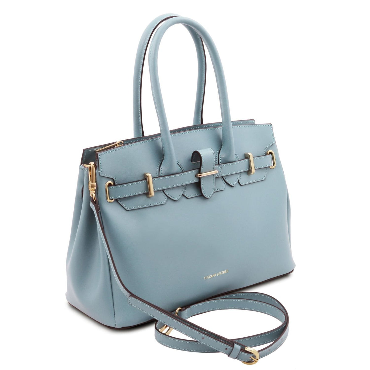 Sleek blue leather handbag with dos asas superiores, herrajes dorados, and correa de hombro extraíble sobre fondo blanco.