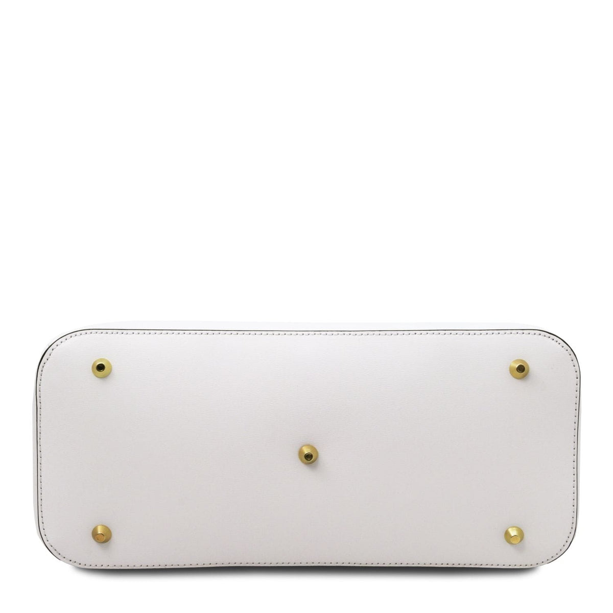 Vista inferior of a white leather handbag with five brass protective feet and detailed stitching along the edges.