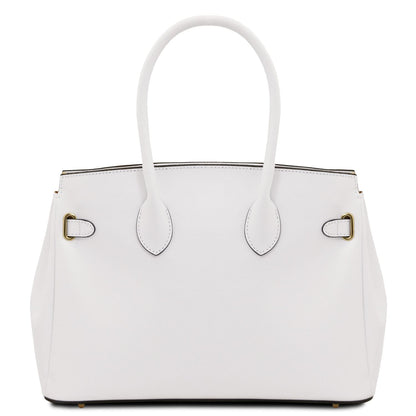 Blanco leather handbag with structured silhouette, rounded handles, and subtle herrajes dorados accents.