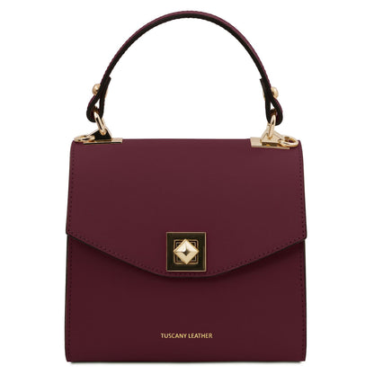 TL Bag - Leather mini bag | TL142203 in burgundy leather with smooth finish, top handle, and gold-tone hardware on white background