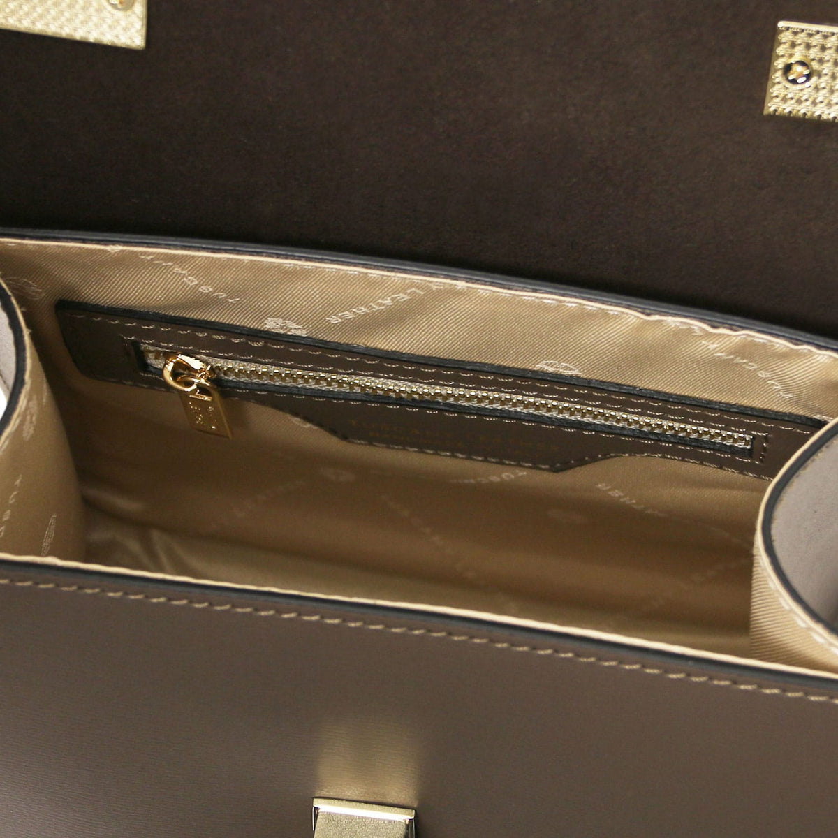 TL Bag - Leather mini bag | TL142203 in smooth brown leather with beige fabric interior lining and interior zip pocket.