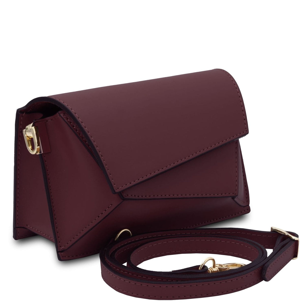 TL Bag - Bolso de hombro de piel  | TL142253 in dark burgundy leather with geometric flap, herrajes dorados, and correa de hombro extraíble sobre fondo blanco
