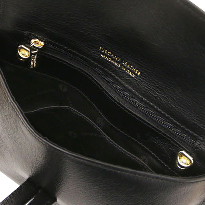 TL Bag - Metallic leather clutch | TL141993 in black leather with internal zip pocket and gold zipper hardware on close-up view.