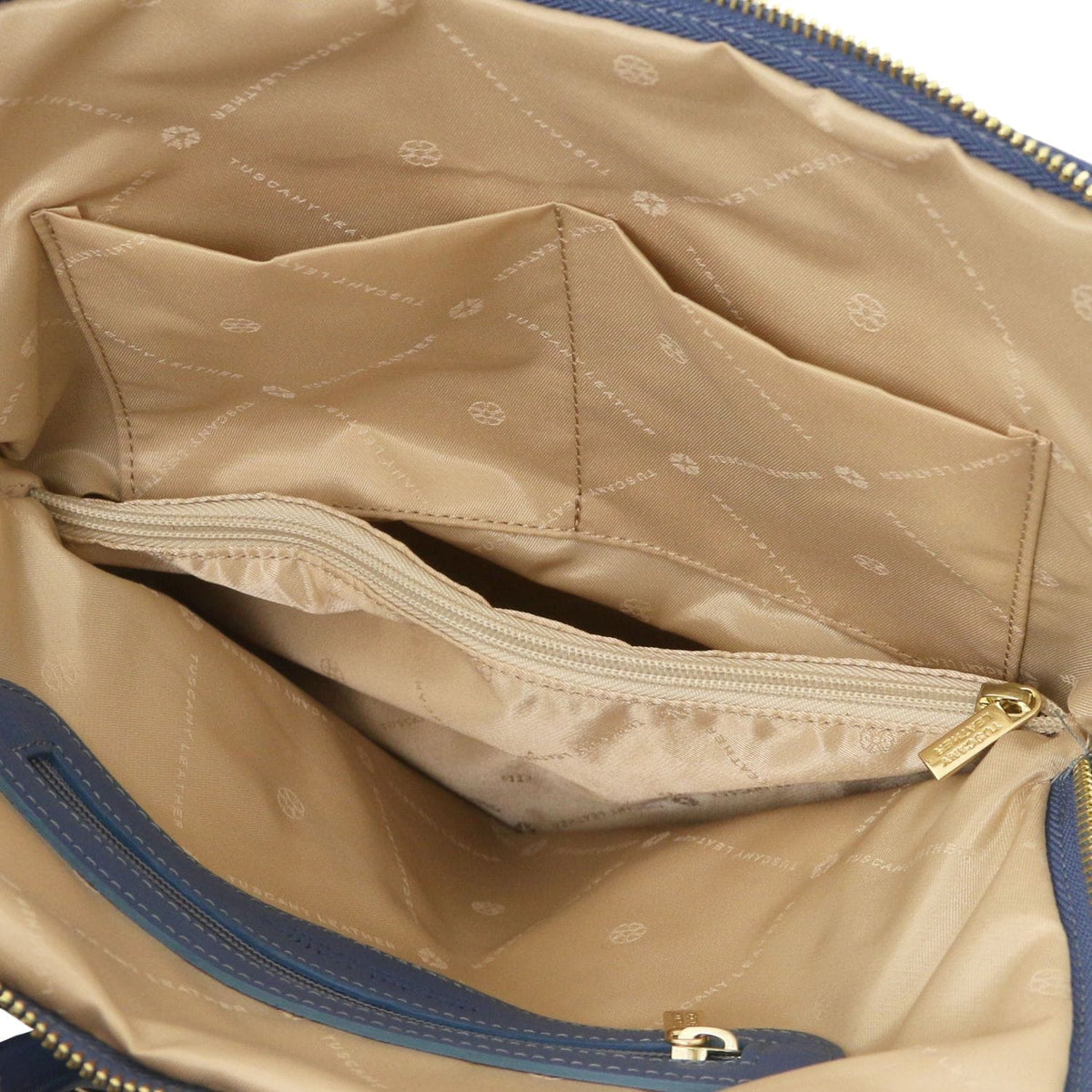 Cognac interior of TL Bag with ritsvak and organized slots.