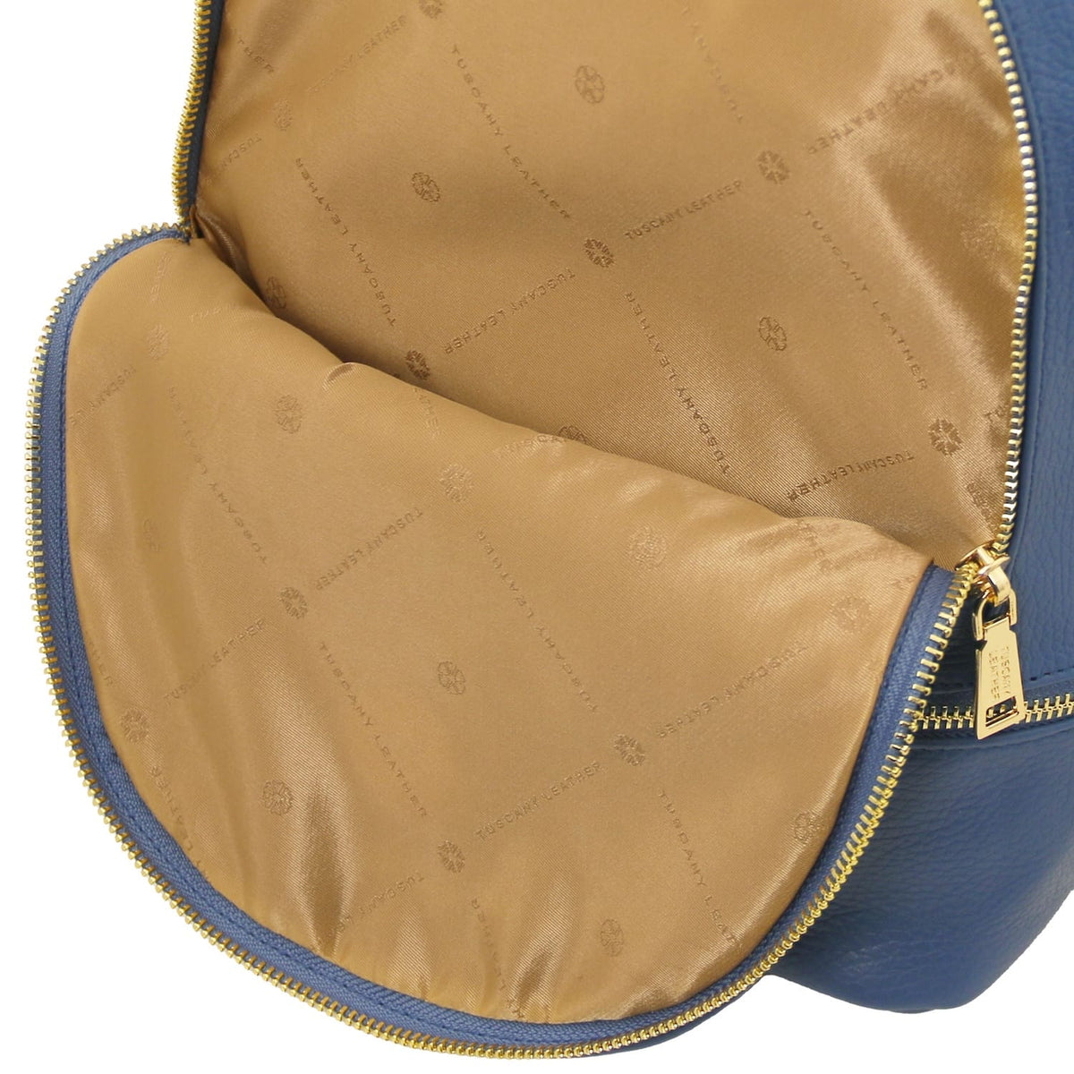 Vue intérieure of TL Bag showing cognac patterned lining and edge zipper with finitions dorées.